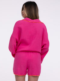 Musselin-Shorts „Stitches" in Rosa/Orange